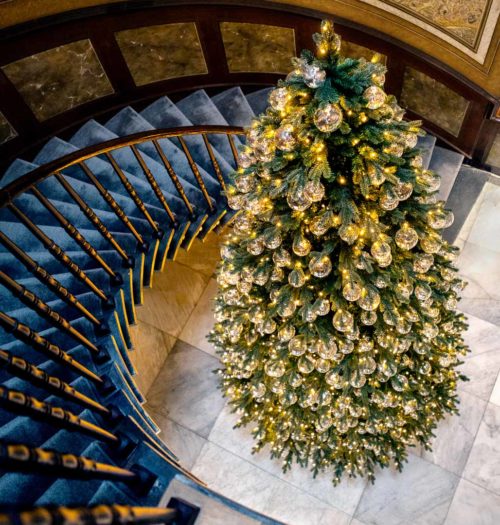 Spiral stairs with christmas tree at Pillows Hotels in Ghent
